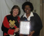 The GIFTS Literacy Program presents First Book with a Certificate of Appreciation
