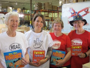 Volunteers from First Book Canada and Pi Beta Phi at a books distribution in Calgary, June 2011