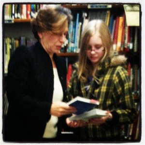 AFT President Randi Weingarten shares a new book from First Book with a student in McDowell County , West Virginia