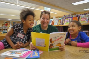 TD Charitable Foundation volunteers read to children at a reading party & books provided by First Book