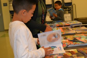 Students in Los Angeles receive brand-new books through First Book and the Guru Krupa Foundation