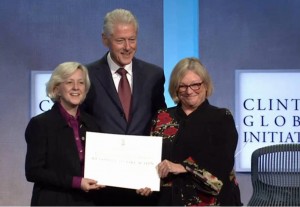 Kyle Zimmer, CEO of First Book, with President Bill Clinton and Dr. Jo Beall of the British Council, at the Clinton Global Initiative annual meeting in New York.