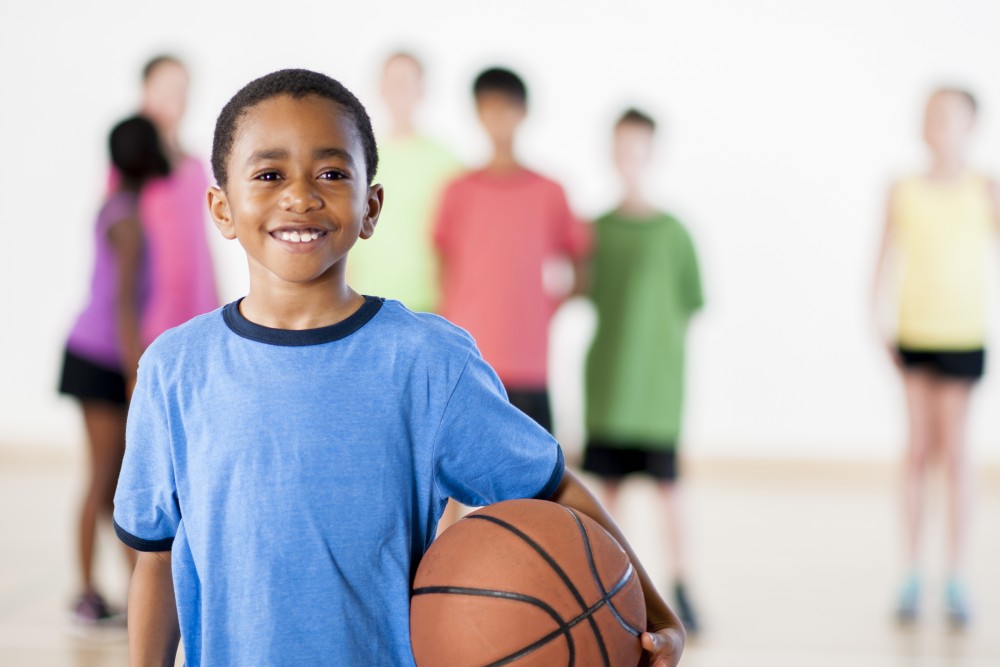 kid with basketball